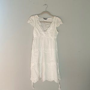 Size 2 BCBG MAXAZRIA white cap sleeve dress with eyelet lace details.